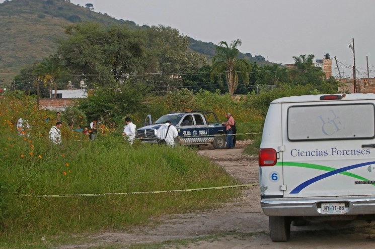 Peritos de Ciencias Forenses durante una diligencia en el municipio de Tonalá, Jalisco en imagen de archivo. Foto Cuartoscuro