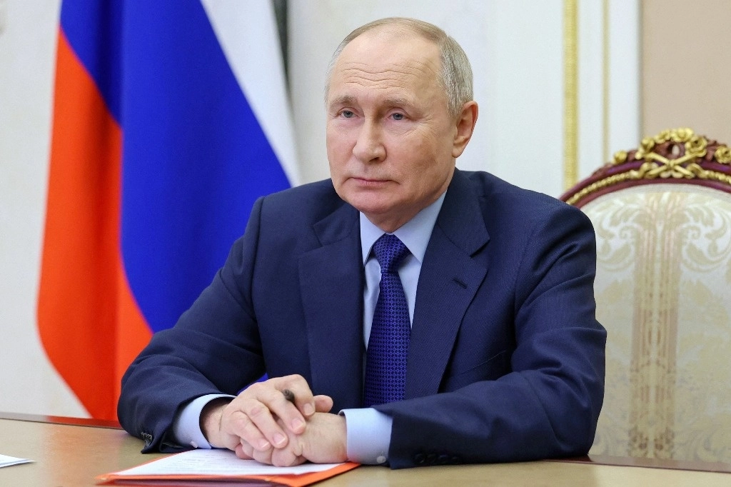 El presidente de Rusia, Vladimir Putin, durante una reunión con miembros del Consejo de Seguridad por videoconferencia en el Kremlin de Moscú, el 9 de febrero de 2024. Foto Afp