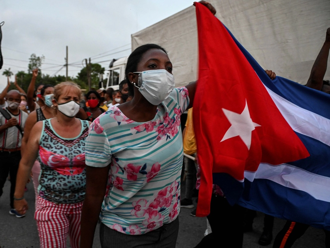 Manifestación en apoyo al gobierno del presidente cubano Miguel Díaz-Canel en el municipio de Arroyo Naranjo, La Habana. Foto: Afp