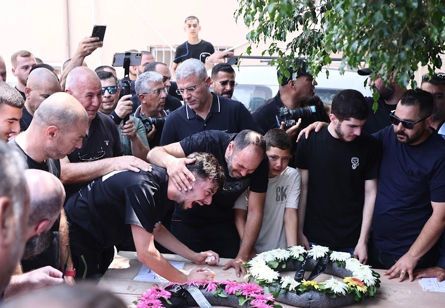 Funeral por algunas de las víctimas abatidas en un ataque con misiles iraníes, en Tamra, localidad en el norte de Israel. Foto 