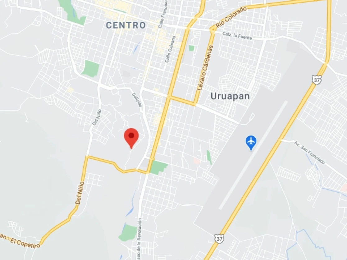 Los cadáveres de dos mujeres con huellas de tortura y varios impactos de arma de fuego fueron localizados esta madrugada en la calle Efrén Capiz, de la colonia Valle de las Delicias, en Uruapan, informó la Secretaría de Seguridad Pública de Michoacán. Imagen tomada de Google Maps