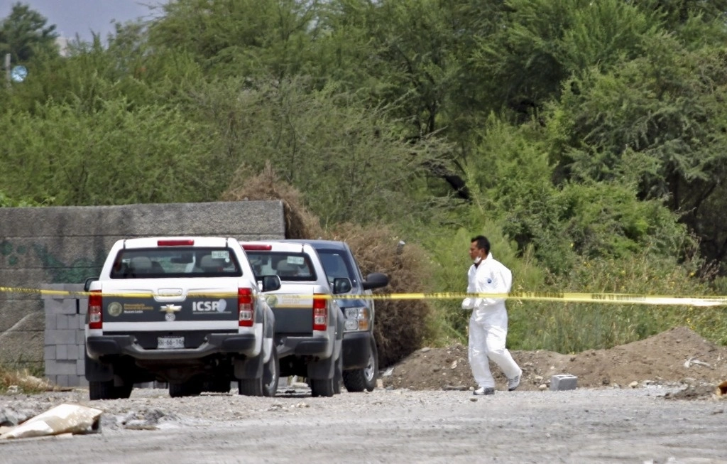 Personal forense en Nuevo León en imagen de archivo de 2014. Foto Cuartoscuro