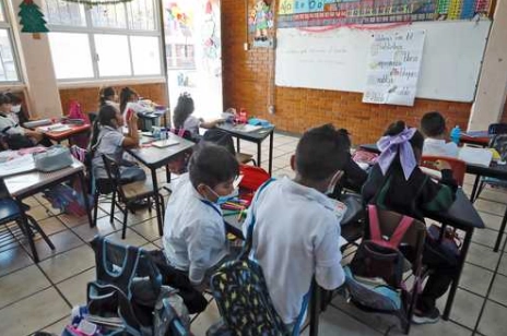 Niños en una primaria de la Ciudad de México. Foto Cristina Rodríguez /Archivo