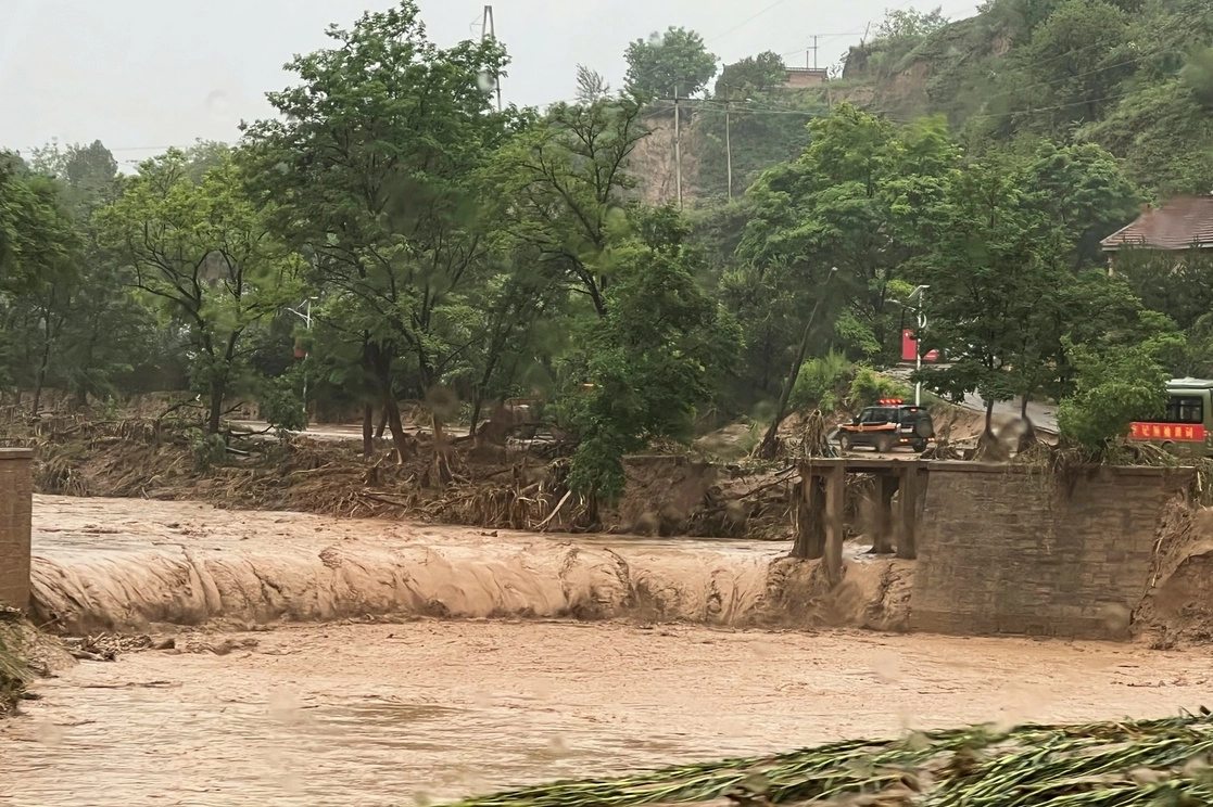 Las intensas precipitaciones en Qingyang, provincia de Gansu, dejaron seis muertos y más de tres mil evacuados. La imagen, del 16 de julio de 2022. Foto Ap 