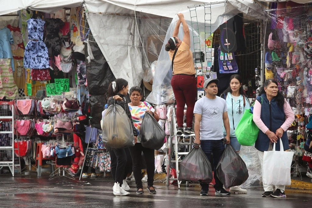 Comerciantes del mercado de La Merced en la Ciudad de México. Foto María Luisa Severiano