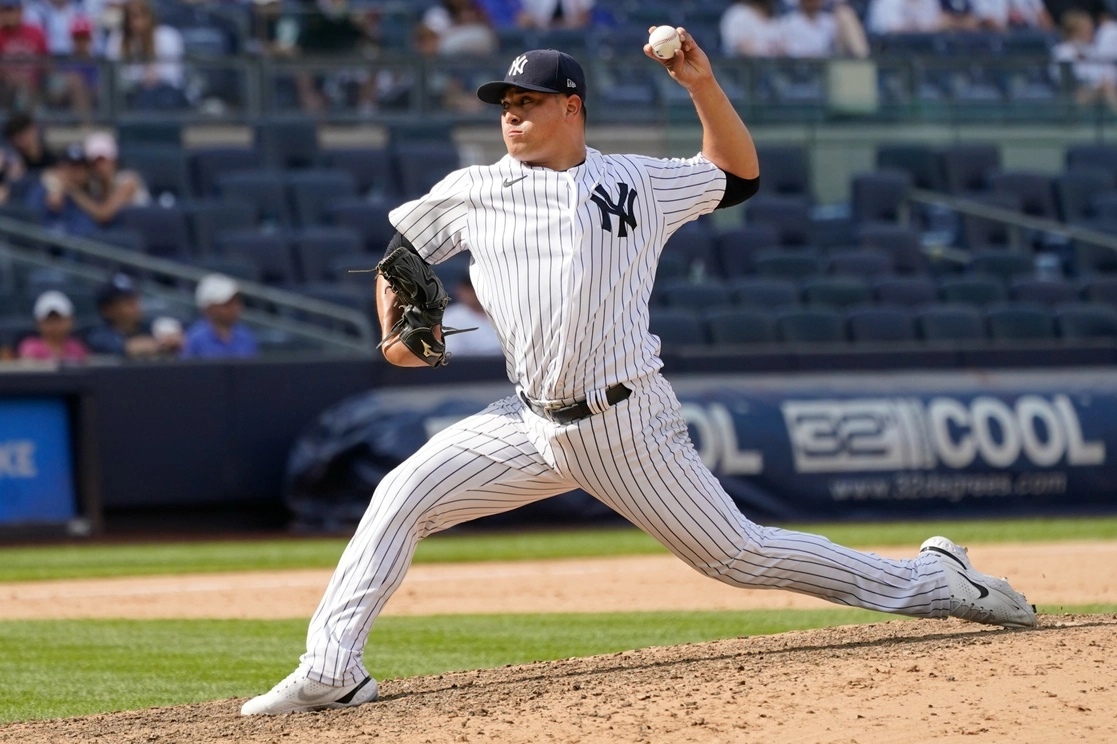 El lanzador de los Yankees de Nueva York, Manny Bañuelos, durante el juego contra los Cachorros de Chicago. Foto Ap