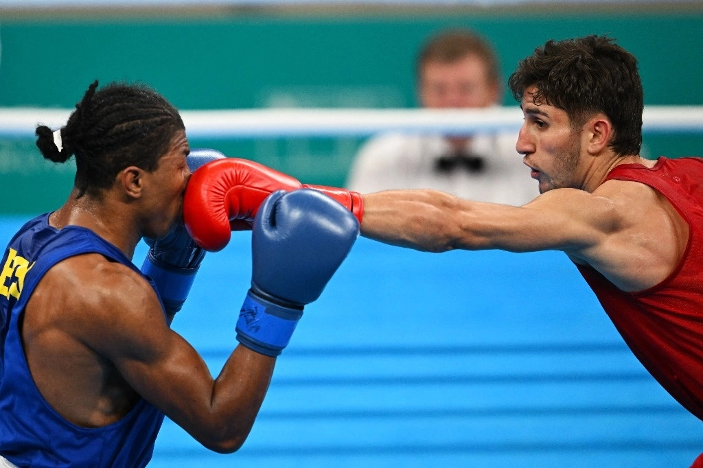 El boxeador mexicano Marco Verde cumplió con su segundo reto en los Juegos Panamericanos Santiago 2023 al ganar la medalla de oro en los 71 kilogramos después de vencer por decisión unánime al ecuatoriano José Rodríguez, el 27 de octubre de 2023. Foto Afp