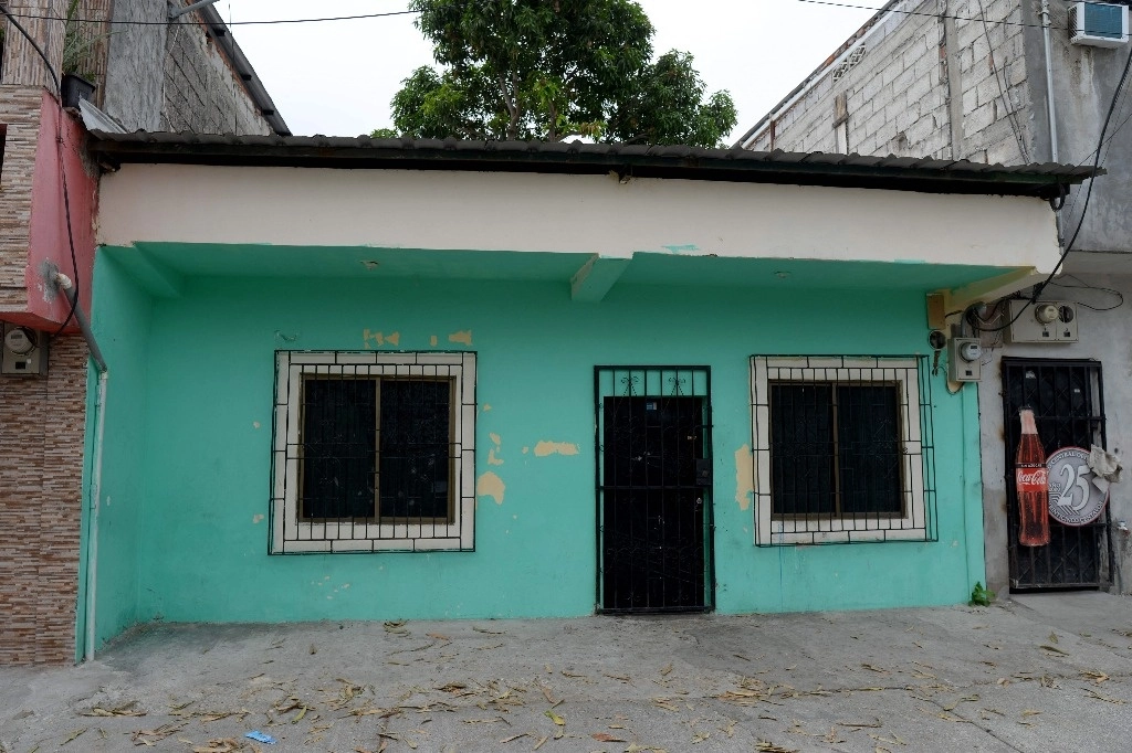 Vista de la casa donde cuatro niños fueron asesinados por hombres armados en Guayaquil, Ecuador, el 12 de diciembre de 2023. Foto Afp