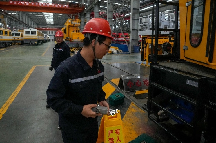 Trabajadores en una fábrica China. Foto Ap
