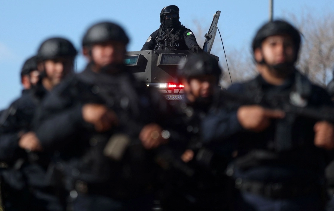 Agentes de seguridad de Chihuahua durante el funeral de los guardias del Cereso 3, asesinados el 1 de enero pasado en Ciudad Juárez, en imagen de ayer. Foto Afp 