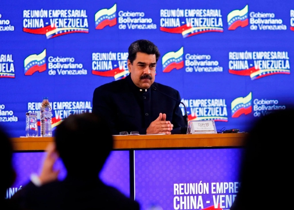 Nicolás Maduro, presidente de Venezuela durante la reunión en Caracas con representantes de empresas de China. Foto Afp