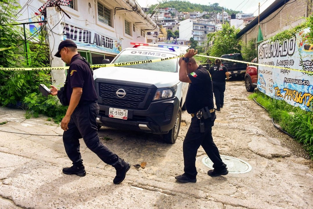 Dos cuerpos con huellas de tortura fueron dejados en la calle Campesino de la colonia Revolución, en Acapulco, Guerrero. Foto