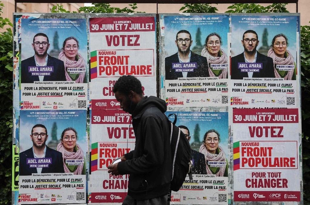 Propaganda de la coalición de izquierdas Nuevo Frente Popular de cara al balotaje de las elecciones legislativas en Francia. Foto Afp
