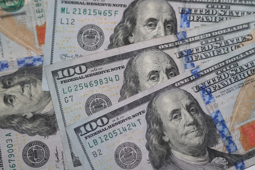 Esta fotografía de archivo del 22 de enero de 2020 muestra la imagen de Benjamin Franklin en billetes de $100. Foto Ap