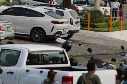 Autoridades acudieron a investigar el sitio donde se perpetró el asesinato. Foto Rubicela Morelos