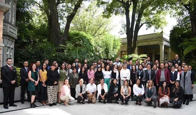 Integrantes de Segob y OIM tras la presentación de la estrategia nacional. Foto Gobernación