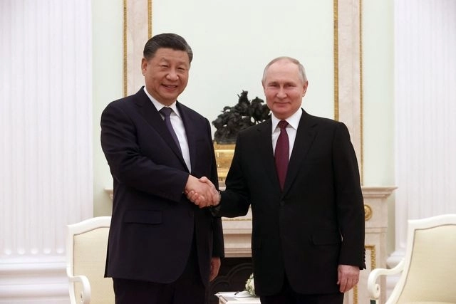 El presidente de China, Xi Jinping y su homólogo Vladimir Putin se reunieron este lunes en Moscú. Foto Afp