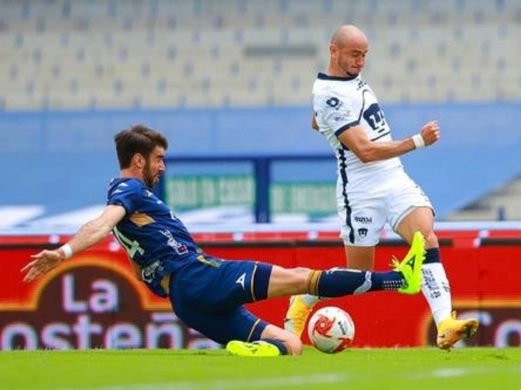 Los potosinos presionaron pero los felinos fueron más certeros en el ataque. Foto Liga Mx / Imago 7