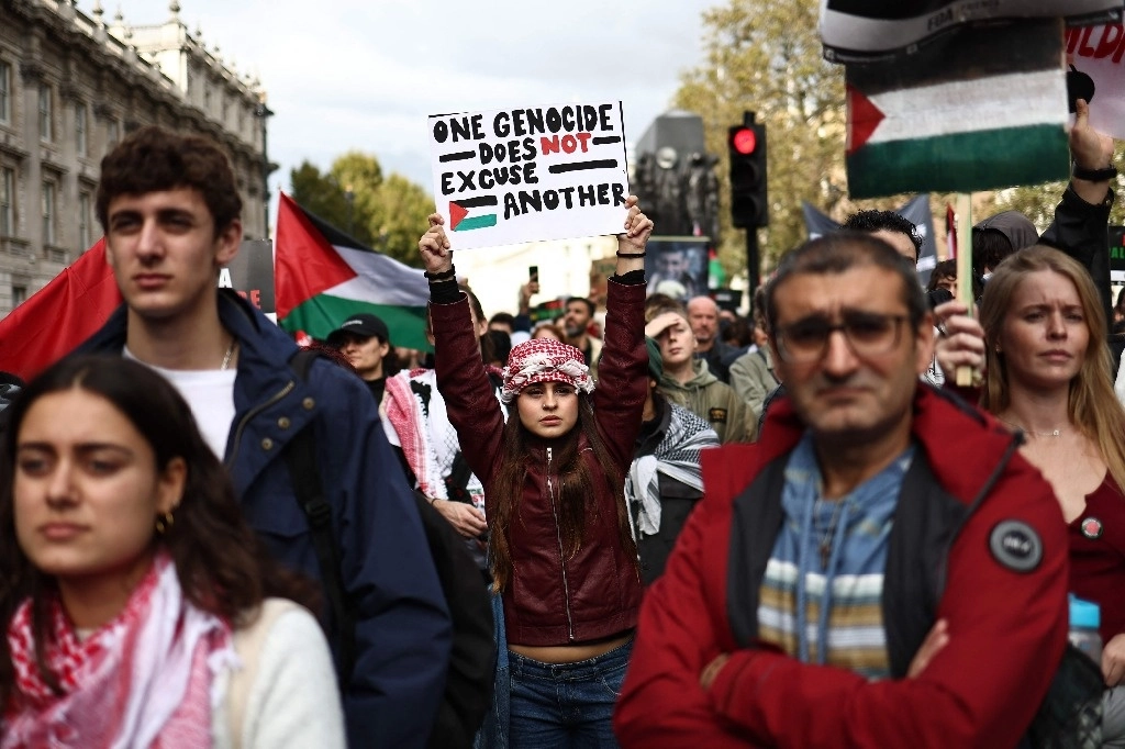 Participantes de la 'Marcha por Palestina', en Londres el 21 de octubre de 2023, para "exigir el fin de la guerra en Gaza". Foto Afp