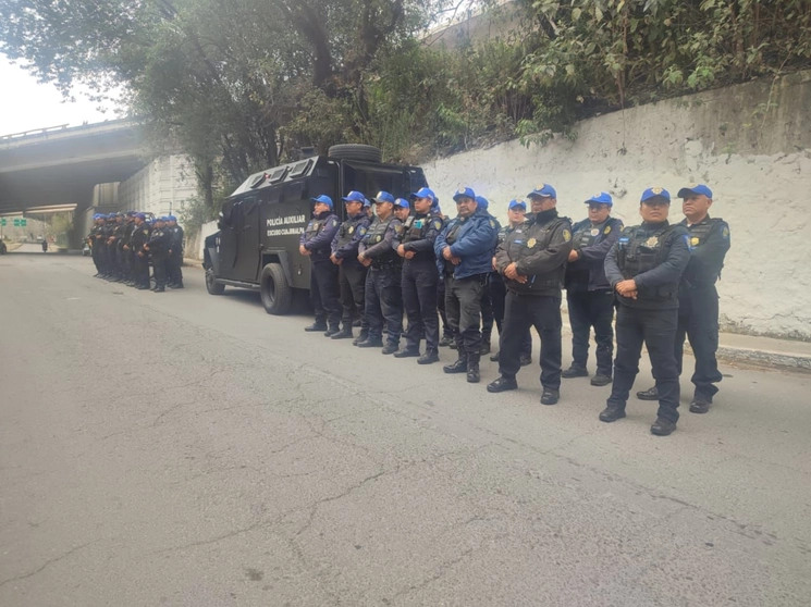 Policías de Cuajimalpa resguardan el panteón de San Lorenzo Acopilco tras la disputa por su administración. Foto Alcaldía Cuajimalpa