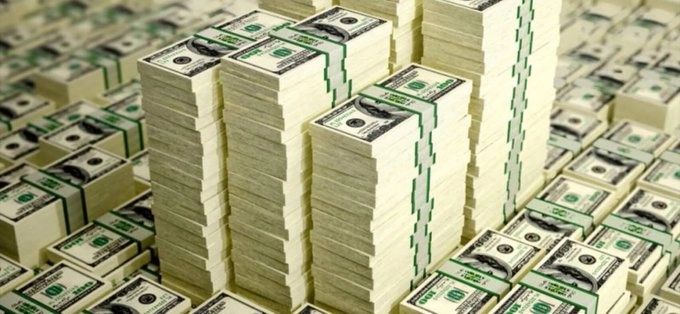 Fajos de billetes de cien dólares. Foto tomada de redes sociales