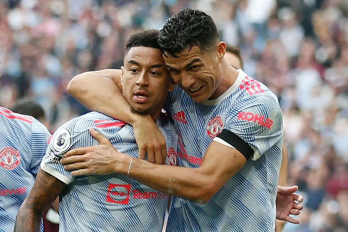 Jesse Lingard y Cristiano Ronaldo fueron los anotadores en la victoria 2-1 ante West Ham, en la fecha cinco de la Liga Premier. Foto Afp
