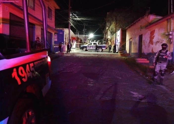 El multihomicidio se perpetró en la calle Benito Juárez del barrio de San Juan. Foto La Jornada / archivo