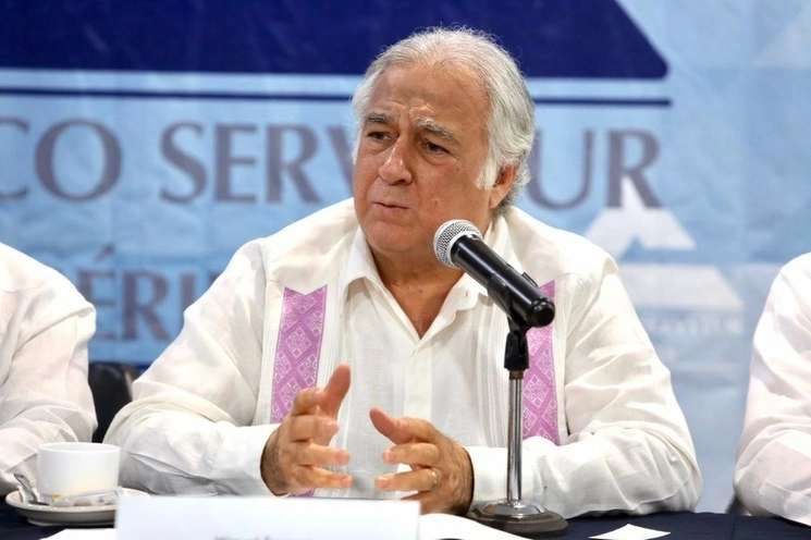 Miguel Torruco en conferencia en Mérida, este sábado. Foto Canaco Mérida