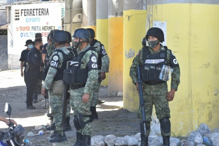 Operativo policiaco montado por la Guardia Nacional, Policía Ministerial, Estatal y Municipal, en Petaquillas, Guerrero. Foto Cuartoscuro / Archivo
