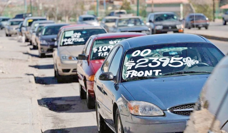 Venta de autos de "chocolate" en imagen de archivo. Foto Tiempo de Carrera
