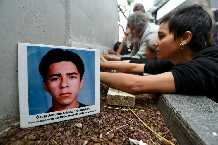 Familiares y amigos de Óscar Antonio López Enamorado durante una protesta en imagen de archivo. Foto Luis Castillo

