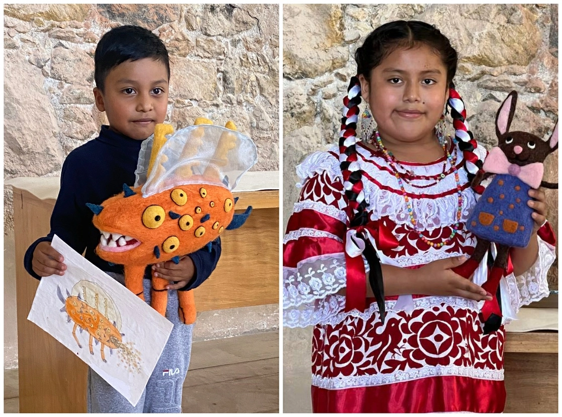 Miguel Ángel Luna, de cinco años, quien ganó con su relato ‘Nísipi’, y Naxu Selina García López, hablante de mazateco de 10 años, con ‘La conejita Fresa’. Foto cortesía de Amigos del IAGO y del CFMAB